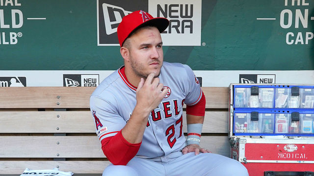OAKLAND, CALIFORNIA - SEPTEMBER 04: Mike Trout #27 of the Los Angeles Angels of Anaheim sits in the dugout and looks on prior to his game against the Oakland Athletics at Ring Central Coliseum on September 04, 2019 in Oakland, California.