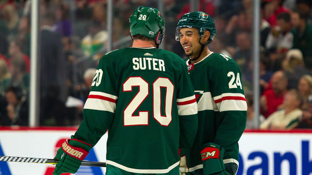 ST. PAUL, MN - SEPTEMBER 23: Minnesota Wild defenseman Matt Dumba (24) (L) laughs with defenseman Ryan Suter (20) during the preseason game between the Colorado Avalanche and the Minnesota Wild on September 23, 2017 at Xcel Energy Center in St. Paul, Minnesota.
