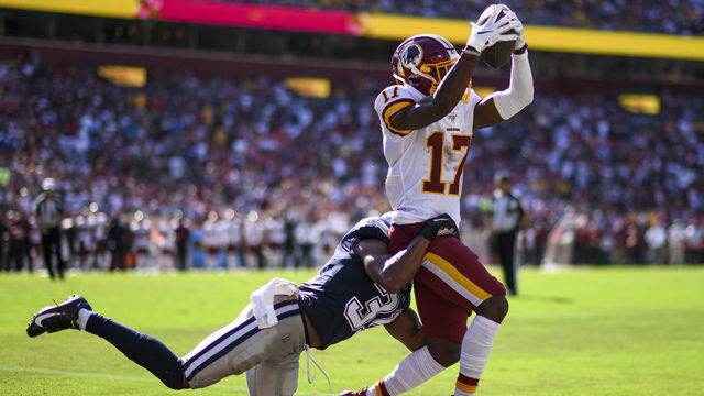 LANDOVER, MD - SEPTEMBER 15: Washington Redskins wide receiver Terry McLaurin (17) catches a one yard touchdown pass against Dallas Cowboys cornerback Byron Jones (31) on September 15, 2019, at FedEx Field in Landover, MD.