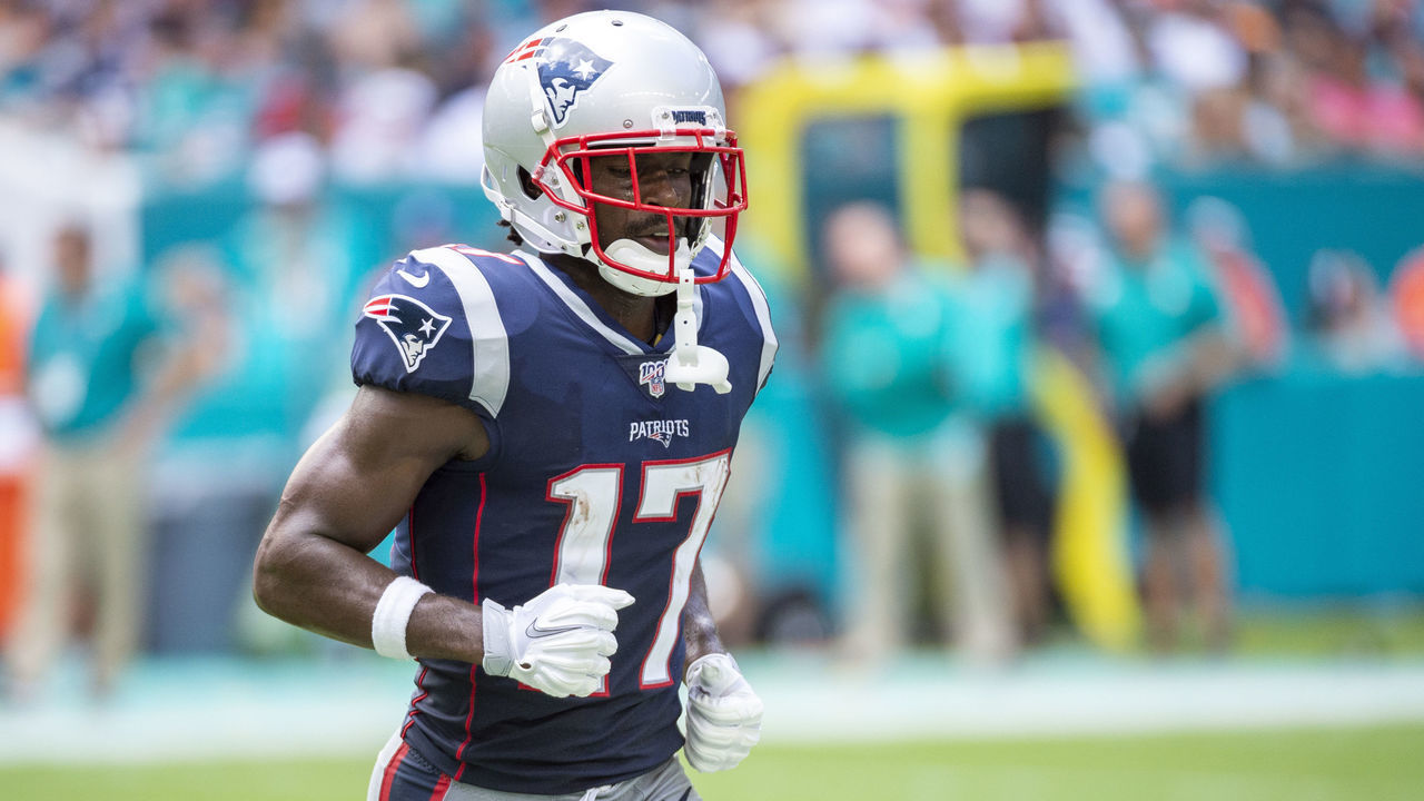 MIAMI GARDENS, FL - SEPTEMBER 15: New England Patriots Wide Receiver Antonio Brown (17) runs off the field during the NFL game between the New England Patriots and the Miami Dolphins at the Hard Rock Stadium in Miami Gardens, Florida on September 15, 2019.