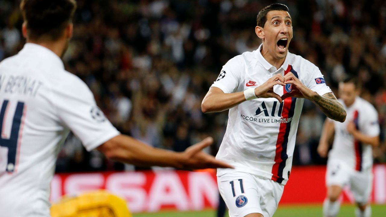 Paris Saint-Germain's Argentine midfielder Angel Di Maria celebrates scoring his team's first goal during the UEFA Champions league Group A football match between Paris Saint-Germain and Real Madrid, at the Parc des Princes stadium, in Paris, on September 18, 2019.