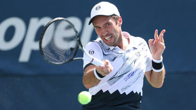 NEW YORK, NEW YORK - AUGUST 29: Mikhail Kukushkin of Kazakhstan returns a shot during his Men's Singles second round match against Alexei Popyrin of Australia on day four of the 2019 US Open at the USTA Billie Jean King National Tennis Center on August 29, 2019 in Queens borough of New York City.