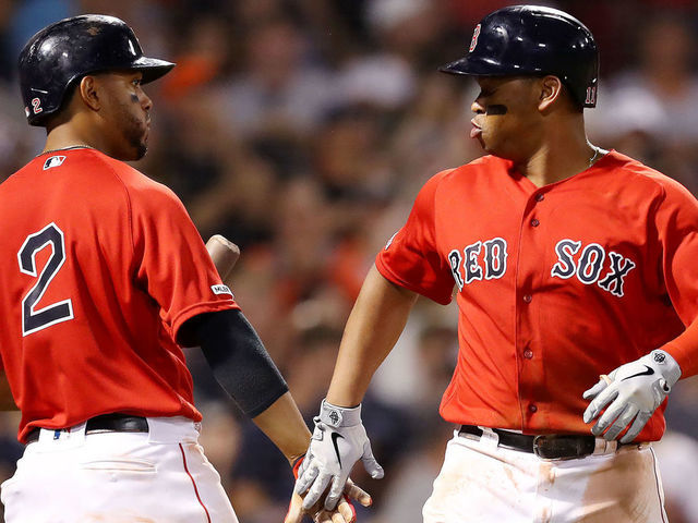 Boston Red Sox third baseman Rafael Devers celebrates his solo HR News  Photo - Getty Images