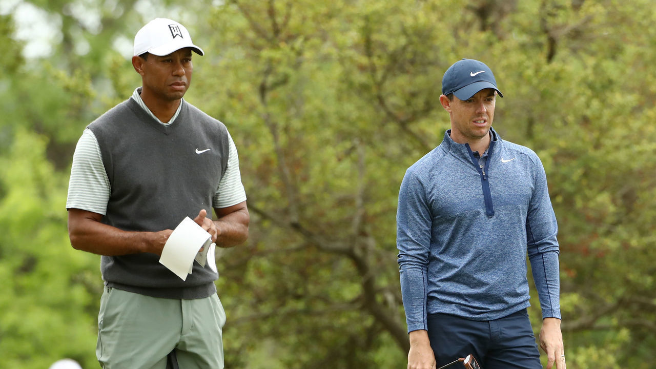 AUSTIN, TEXAS - MARCH 30: Tiger Woods of the United States and Rory McIlroy of Northern Ireland look on from the tenth green during the fourth round of the World Golf Championships-Dell Technologies Match Play at Austin Country Club on March 30, 2019 in Austin, Texas.