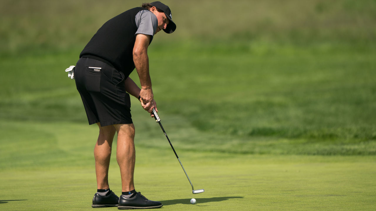 FARMINGDALE, NY - MAY 15: Phil Mickelson makes his putt on the 16th hole during a practice round for the 101st PGA Championship held at Bethpage Black Golf Course on May 15, 2019 in Farmingdale, New York.