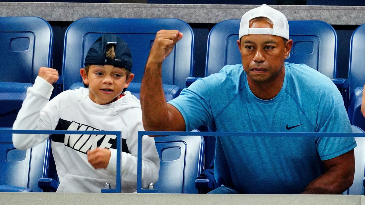 NEW YORK, NEW YORK - SEPTEMBER 03: (L-R) Charlie Axel Woods and Tiger Woods are seen at The 2019 US Open Tennis Championships on September 03, 2019 in New York City.
