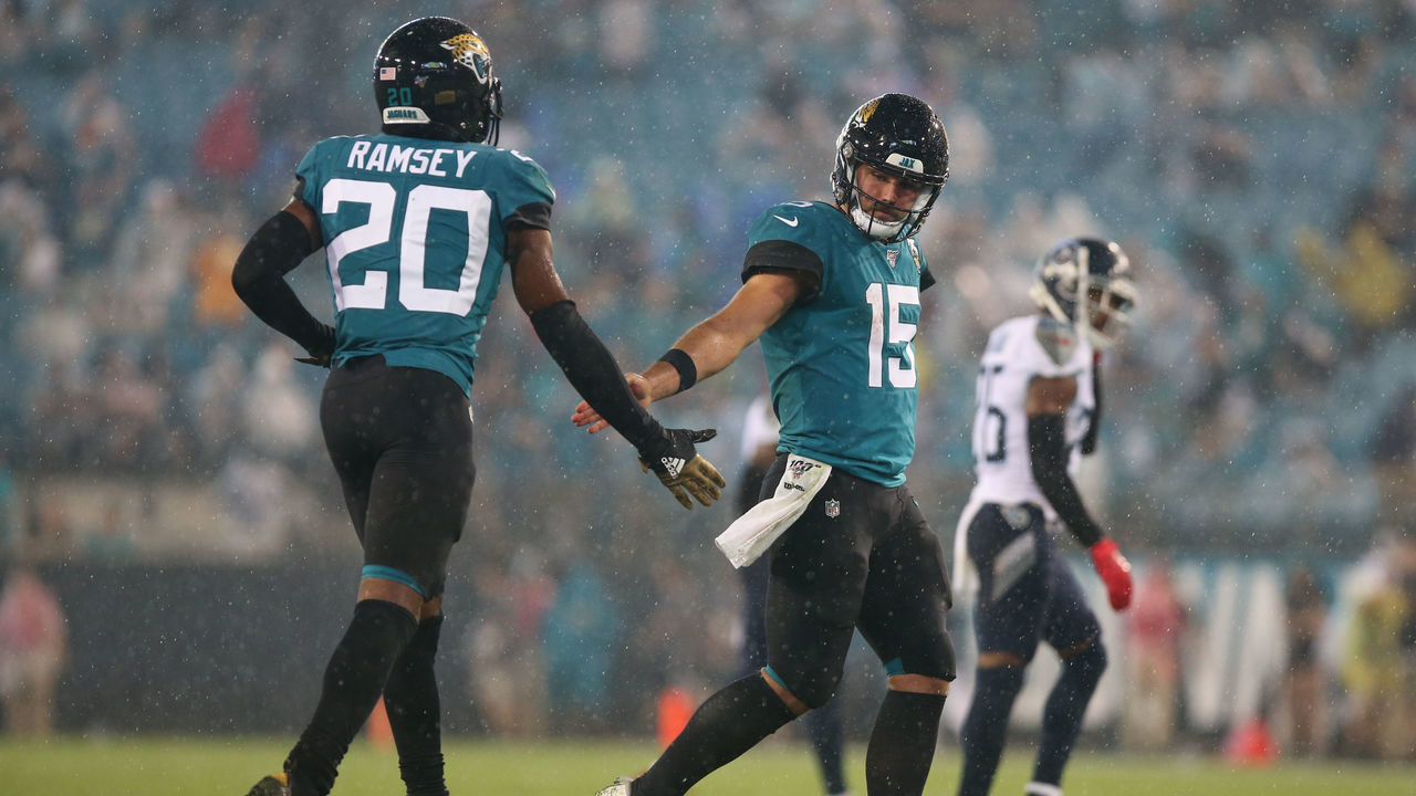 JACKSONVILLE, FL - SEPTEMBER 19: Jacksonville Jaguars Quarterback Gardner Minshew II (15) and Jacksonville Jaguars Cornerback Jalen Ramsey (20) during the game between the Tennessee Titans and the Jacksonville Jaguars on September 19, 2019 at TIAA Bank Field in Jacksonville, Fl.