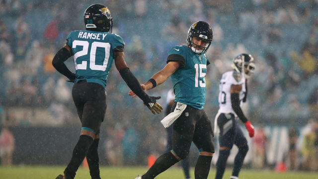 JACKSONVILLE, FL - SEPTEMBER 19: Jacksonville Jaguars Quarterback Gardner Minshew II (15) and Jacksonville Jaguars Cornerback Jalen Ramsey (20) during the game between the Tennessee Titans and the Jacksonville Jaguars on September 19, 2019 at TIAA Bank Field in Jacksonville, Fl.