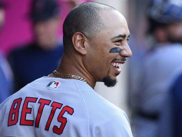 ANAHEIM, CA - AUGUST 31: Boston Red Sox center fielder Mookie Betts (50) looks on in the dugout during a MLB game between the Boston Red Sox and the Los Angeles Angels of Anaheim on August 31, 2019 at Angel Stadium of Anaheim in Anaheim, CA.