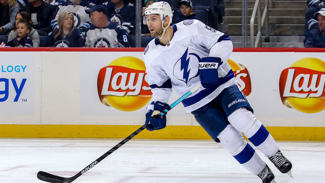 WINNIPEG, MB - DECEMBER 16: Dan Girardi #5 of the Tampa Bay Lightning keeps an eye on the play during third period action against the Winnipeg Jets at the Bell MTS Place on December 16, 2018 in Winnipeg, Manitoba, Canada. The Jets defeated the Lightning 5-4 in overtime.
