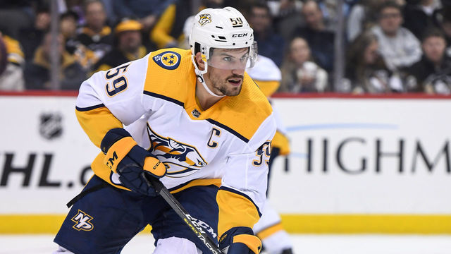 PITTSBURGH, PA - MARCH 29: Nashville Predators Defenseman Roman Josi (59) moves the puck during the second period in the NHL game between the Pittsburgh Penguins and the Nashville Predators on March 29, 2019, at PPG Paints Arena in Pittsburgh, PA.
