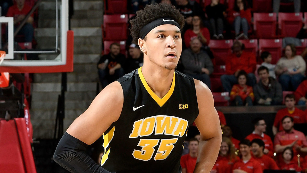COLLEGE PARK, MD - JANUARY 07: Cordell Pemsl #35 of the Iowa Hawkeyes handles the ball against the Maryland Terrapins at Xfinity Center on January 7, 2018 in College Park, Maryland.