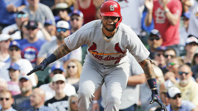 CHICAGO, ILLINOIS - SEPTEMBER 20: Yadier Molina #4 of the St. Louis Cardinals reacts after his two RBI single during the sixth inning of a game against the Chicago Cubs at Wrigley Field on September 20, 2019 in Chicago, Illinois.