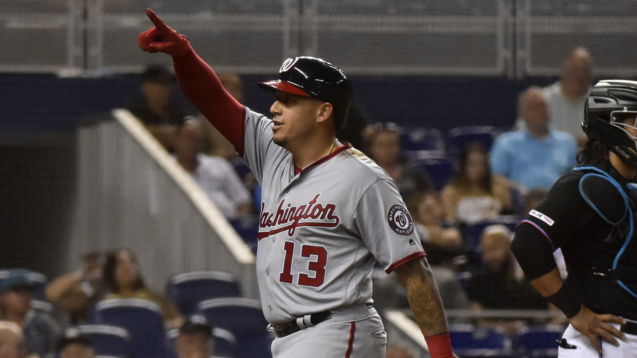 MIAMI, FL - SEPTEMBER 20: Asdrubal Cabrera #13 of the Washington Nationals points to the crowd after hitting a home run in the fourth inning against the Miami Marlins at Marlins Park on September 20, 2019 in Miami, Florida.