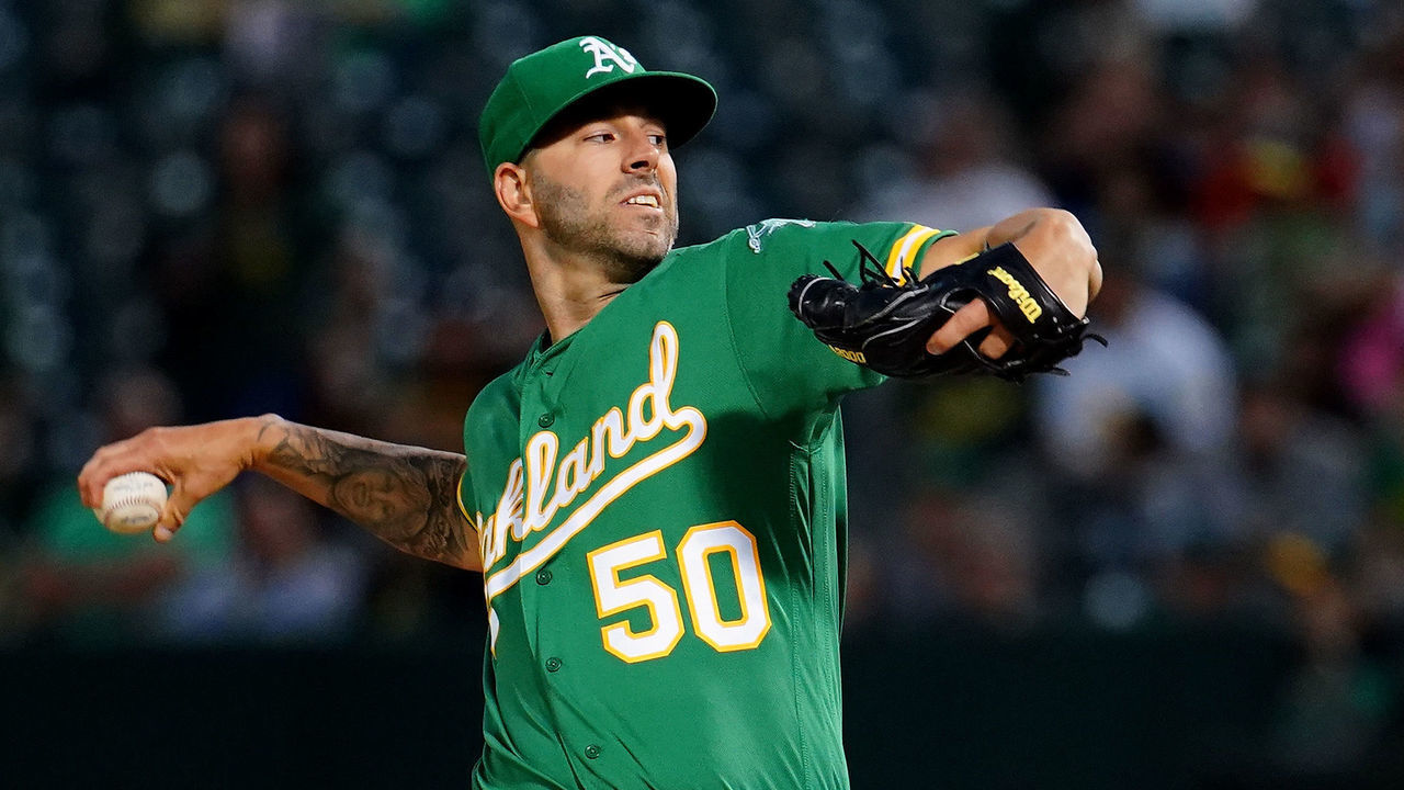 OAKLAND, CALIFORNIA - SEPTEMBER 20: Mike Fiers #50 of the Oakland Athletics pitches during the first inning against the Texas Rangers at Ring Central Coliseum on September 20, 2019 in Oakland, California.