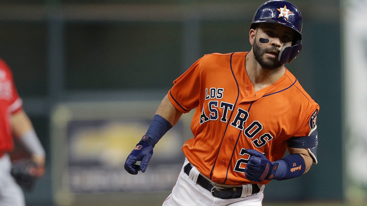 HOUSTON, TEXAS - SEPTEMBER 20: Jose Altuve #27 of the Houston Astros hits a home run in the first inning against the Los Angeles Angels at Minute Maid Park on September 20, 2019 in Houston, Texas.