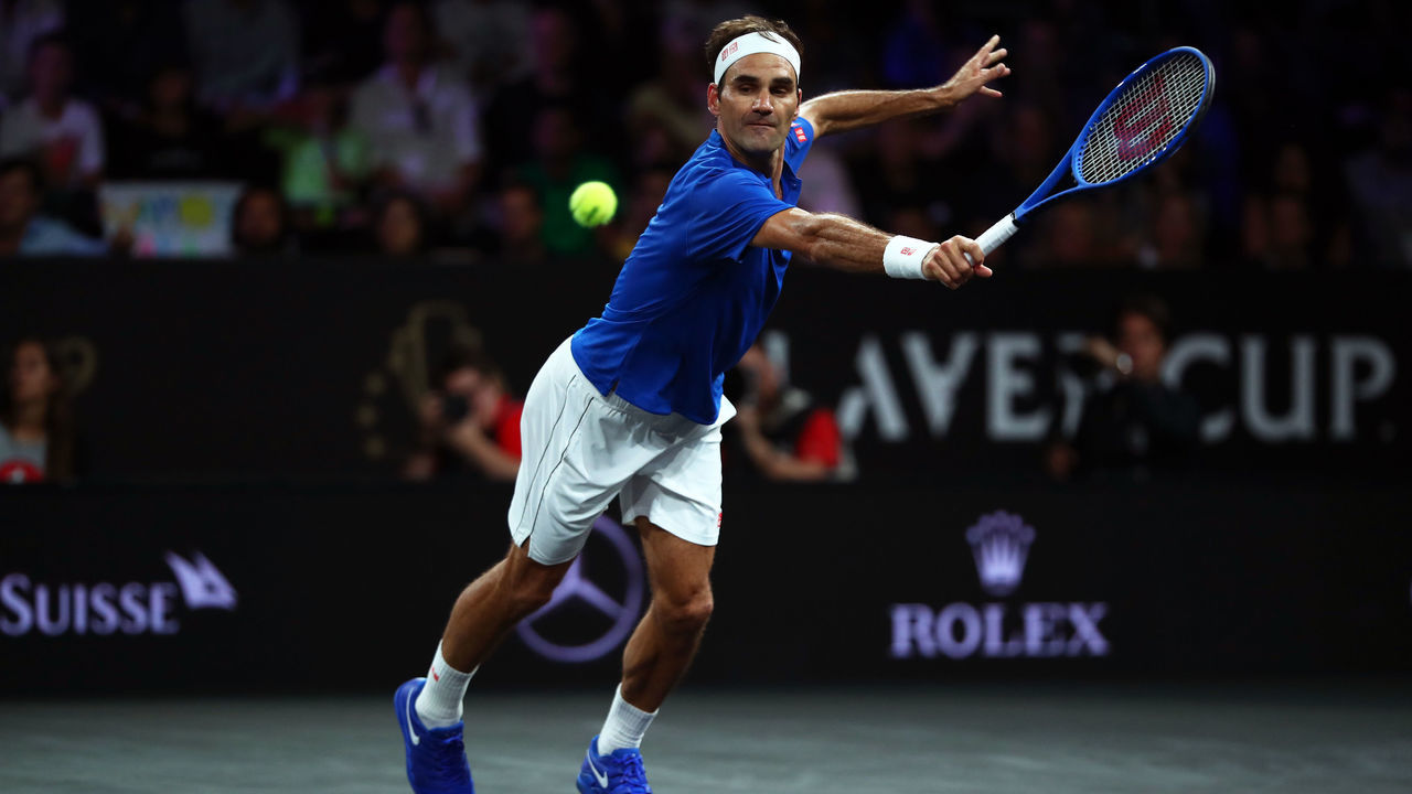 GENEVA, SWITZERLAND - SEPTEMBER 21: Roger Federer of Team Europe stretches to play a backhand in his singles match against Nick Kyrgios of Team World during Day Two of the Laver Cup 2019 at Palexpo on September 21, 2019 in Geneva, Switzerland. The Laver Cup will see six players from the rest of the World competing against their counterparts from Europe. Team World is captained by John McEnroe and Team Europe is captained by Bjorn Borg. The tournament runs from September 20-22.