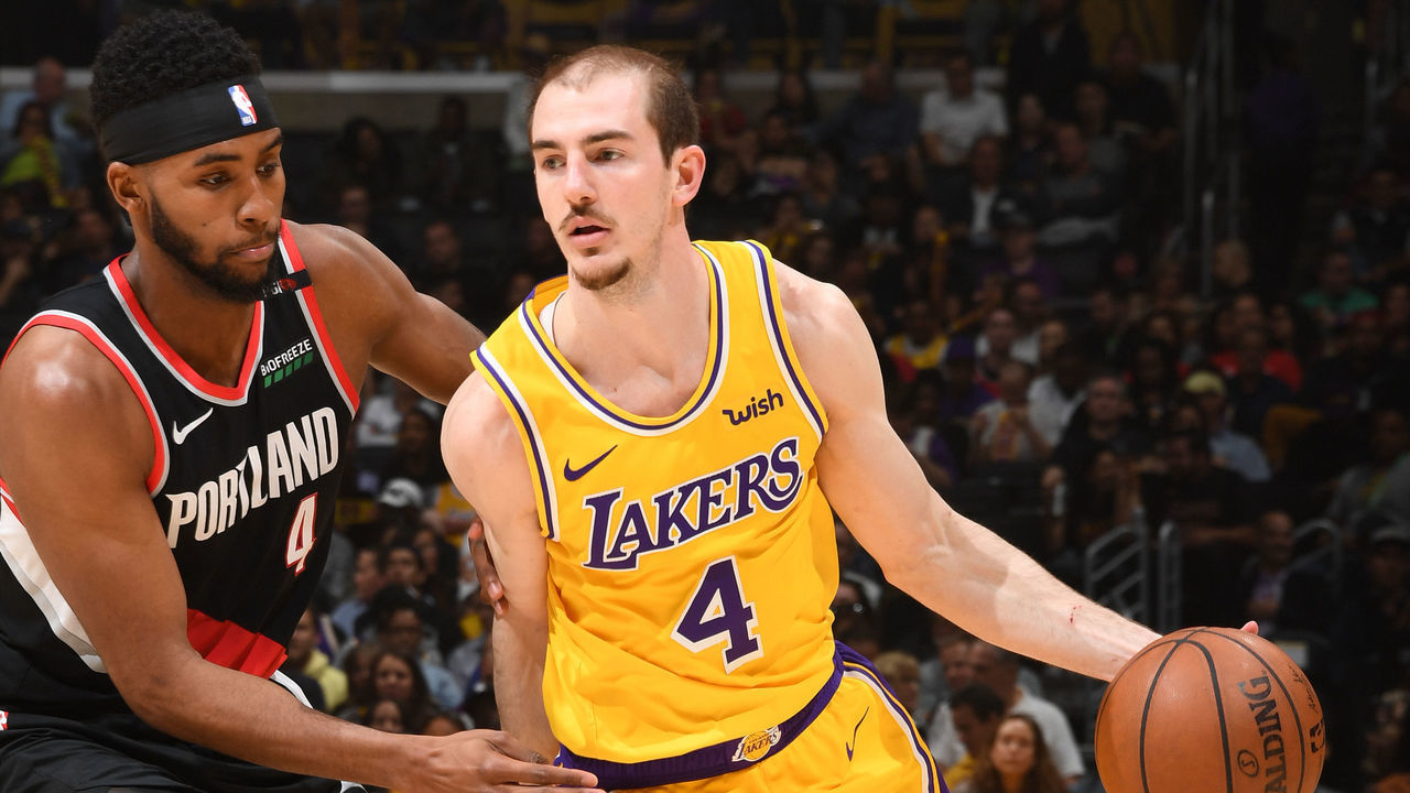 LOS ANGELES, CA - APRIL 9: Alex Caruso #4 of the Los Angeles Lakers handles the ball against the Portland Trail Blazers on April 9, 2019 at STAPLES Center in Los Angeles, California. NOTE TO USER: User expressly acknowledges and agrees that, by downloading and/or using this Photograph, user is consenting to the terms and conditions of the Getty Images License Agreement. Mandatory Copyright Notice: Copyright 2019 NBAE