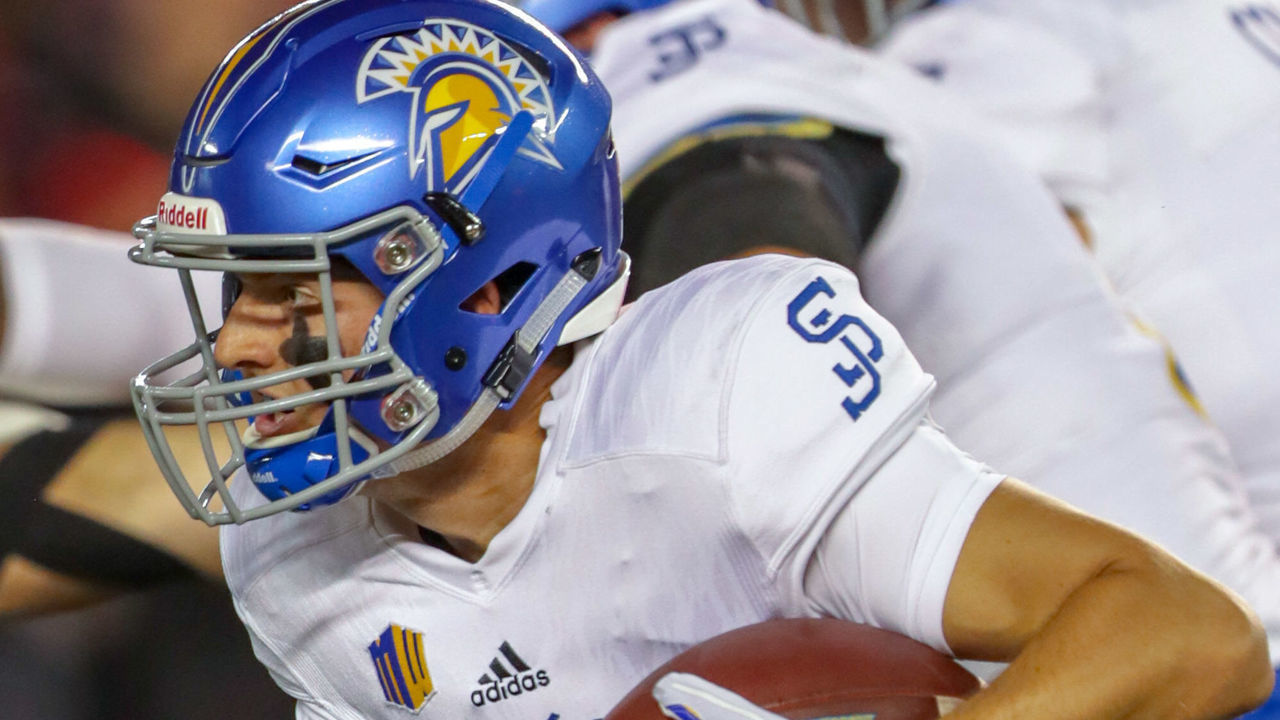 SAN DIEGO, CA - OCTOBER 20: Josh Love #12 of the San Jose State Spartans runs with the ball in the first half against the San Diego State Aztecs at SDCCU Stadium on October 20, 2018 in San Diego, California.