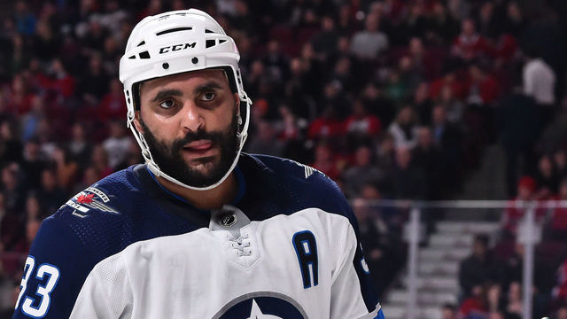 MONTREAL, QC - FEBRUARY 07: Dustin Byfuglien #33 of the Winnipeg Jets looks on against the Montreal Canadiens during the NHL game at the Bell Centre on February 7, 2019 in Montreal, Quebec, Canada. The Montreal Canadiens defeated the Winnipeg Jets 5-2.
