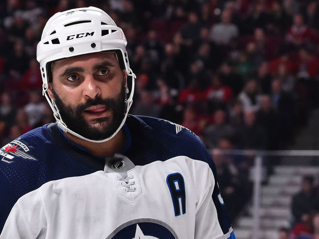 MONTREAL, QC - FEBRUARY 07: Dustin Byfuglien #33 of the Winnipeg Jets looks on against the Montreal Canadiens during the NHL game at the Bell Centre on February 7, 2019 in Montreal, Quebec, Canada. The Montreal Canadiens defeated the Winnipeg Jets 5-2.