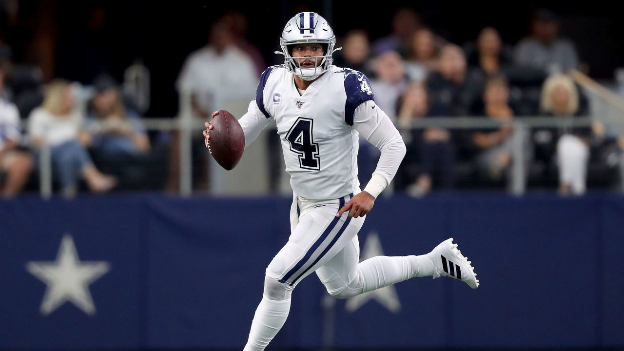 ARLINGTON, TEXAS - SEPTEMBER 22: Dak Prescott #4 of the Dallas Cowboys looks for an open receiver against the Miami Dolphins in the first quarter at AT&T Stadium on September 22, 2019 in Arlington, Texas.