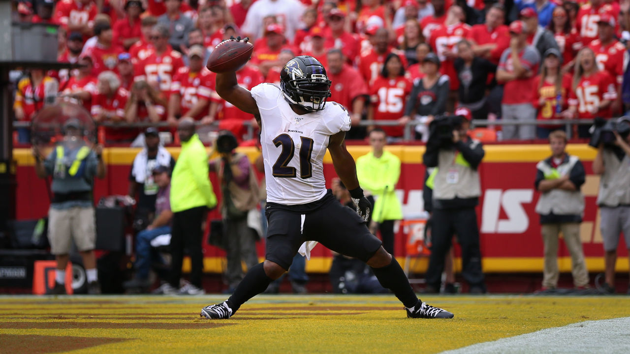 KANSAS CITY, MO - SEPTEMBER 22: Baltimore Ravens running back Mark Ingram (21) spikes the ball to celebrate his 2-yard touchdown run in the first quarter of an AFC matchup between the Baltimore Ravens and Kansas City Chiefs on September 22, 2019 at Arrowhead Stadium in Kansas City, MO.