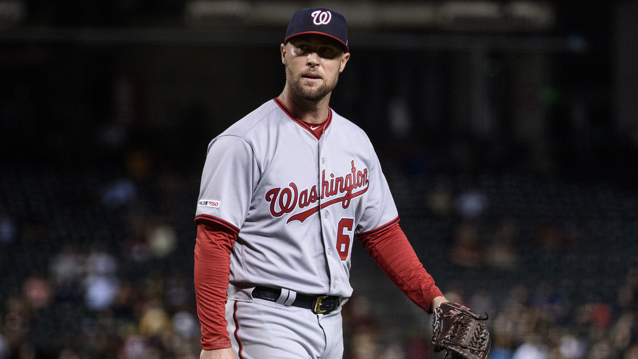 PHOENIX, ARIZONA - AUGUST 02: Hunter Strickland #60 of the Washington Nationals reacts while pitching in the seventh inning of the MLB game against the Arizona Diamondbacks at Chase Field on August 02, 2019 in Phoenix, Arizona. The Nationals won 3-0.