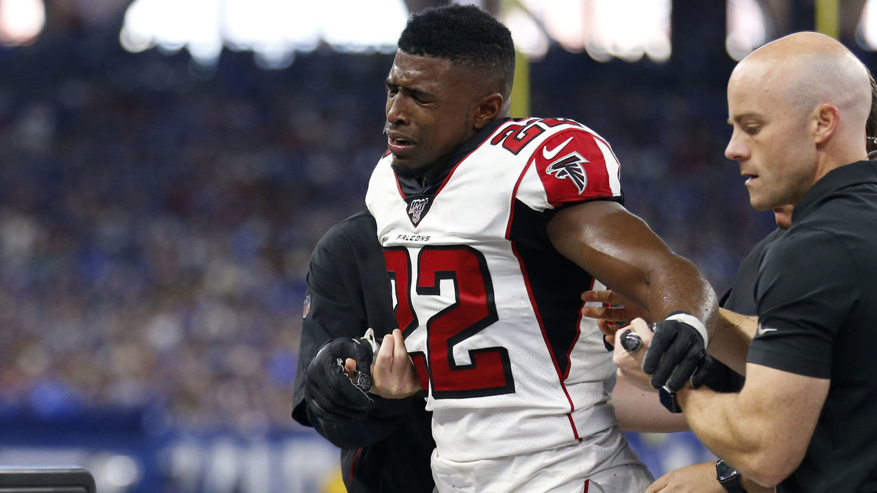 INDIANAPOLIS, INDIANA - SEPTEMBER 22: Keanu Neal #22 of the Atlanta Falcons is helped off the field during the second quarter in the game against the Indianapolis Colts at Lucas Oil Stadium on September 22, 2019 in Indianapolis, Indiana.