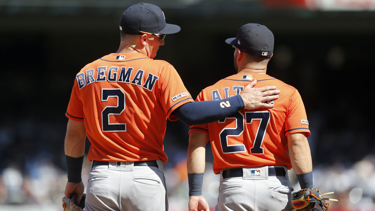 NEW YORK, NEW YORK - JUNE 23: Alex Bregman #2 and Jose Altuve #27 of the Houston Astros in action against the New York Yankees at Yankee Stadium on June 23, 2019 in New York City. The Astros defeated the Yankees 9-4.