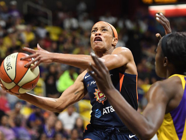 LOS ANGELES, CA - SEPTEMBER 22: Jasmine Thomas #5 of the Connecticut Sun drives to the basket for shot against the Los Angeles Sparks during Game Three of the 2019 WNBA Semifinals on September 22, 2019 at the Walter Pyramid in Long Beach, California Mandatory Copyright Notice: Copyright 2019 NBAE