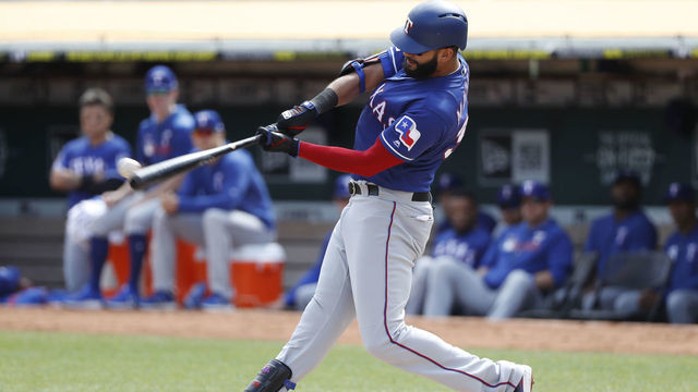 OAKLAND, CA - SEPTEMBER 22: Nomar Mazara #30 of the Texas Rangers swings at a pitch during the first inning against the Oakland Athletics at Ring Central Coliseum on September 22, 2019 in Oakland, California.