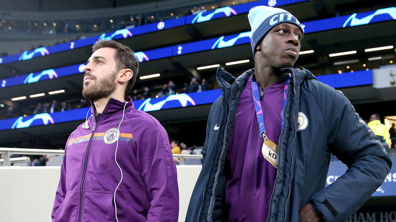 LONDON, ENGLAND - APRIL 09: Benjamin Mendy and Bernardo Silva of Manchester City walk out prior to the UEFA Champions League Quarter Final first leg match between Tottenham Hotspur and Manchester City at Tottenham Hotspur Stadium on April 09, 2019 in London, England.