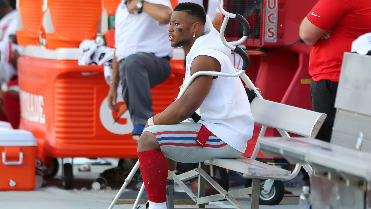TAMPA, FL - SEP 22: Saquon Barkley (26) of the Giants has a high ankle sprain and wears a boot along the sideline during the regular season game between the New York Giants and the Tampa Bay Buccaneers on September 22, 2019 at Raymond James Stadium in Tampa, Florida.