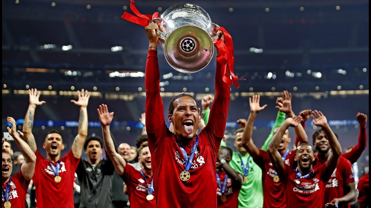 Virgil van Dijk of Liverpool FC lifts the trophy after winning the UEFA Champions League final. during the UEFA Champions League final match between Tottenham Hotspur FC and Liverpool FC at Estadio Metropolitano on June 01, 2019 in Madrid, Spain