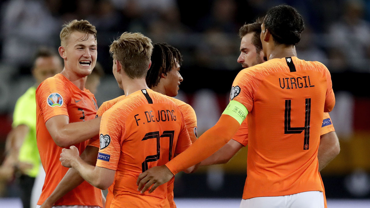 HAMBURG, GERMANY - SEPTEMBER 6: Matthijs de Ligt of Holland, Frenkie de Jong of Holland, Nathan Ake of Holland, Davy Propper of Holland, Virgil van Dijk of Holland celebrates the victory during the EURO Qualifier match between Germany v Holland at the Volkspark Stadium on September 6, 2019 in Hamburg Germany