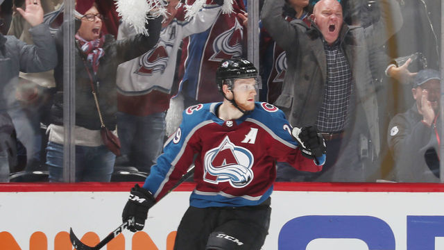 DENVER, CO - APRIL 30: Nathan MacKinnon #29 of the Colorado Avalanche celebrates after scoring a goal against the San Jose Sharks in Game Three of the Western Conference Second Round during the 2019 NHL Stanley Cup Playoffs at the Pepsi Center on April 30, 2019 in Denver, Colorado.