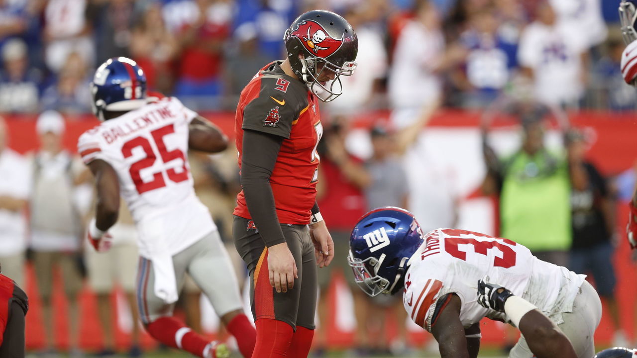 TAMPA, FLORIDA - SEPTEMBER 22: Kicker Matt Gay #9 of the Tampa Bay Buccaneers looks down dejectedly after missing what would have been the game-winning field as time expired during the game against the New York Giants at Raymond James Stadium on September 22, 2019 in Tampa, Florida.