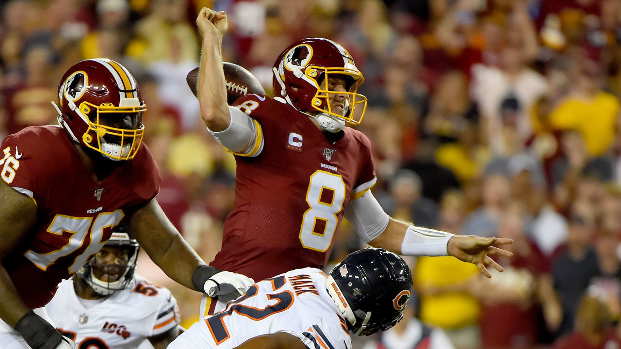 LANDOVER, MD - SEPTEMBER 23: Case Keenum #8 of the Washington Redskins fumbles the football in front of Khalil Mack #52 of the Chicago Bears during the first half at FedExField on September 23, 2019 in Landover, Maryland.