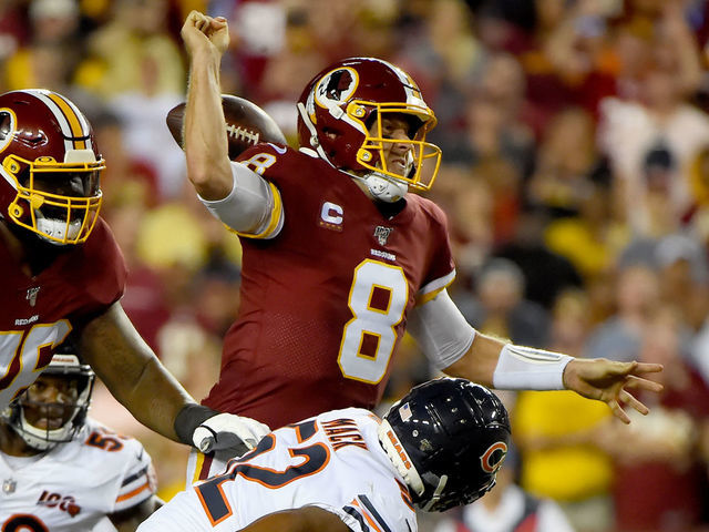 LANDOVER, MD - SEPTEMBER 23: Case Keenum #8 of the Washington Redskins fumbles the football in front of Khalil Mack #52 of the Chicago Bears during the first half at FedExField on September 23, 2019 in Landover, Maryland.