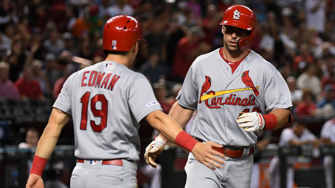 PHOENIX, ARIZONA - SEPTEMBER 23: Paul Goldschmidt #46 of the St. Louis Cardinals celebrates with Tommy Edman #19 after hitting a two run home run off of Alex Young #49 of the Arizona Diamondbacks during the third inning at Chase Field on September 23, 2019 in Phoenix, Arizona. It was Goldschmidt's first time back at Chase Field since being traded to St. Louis.