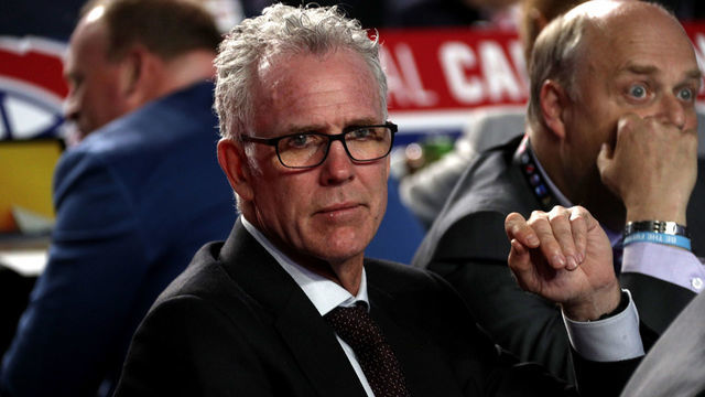 CHICAGO, IL - JUNE 23: Craig MacTavish, VP of hockey operations for the Edmonton Oilers, looks on from the draft table during Round One of the 2017 NHL Draft at United Center on June 23, 2017 in Chicago, Illinois.