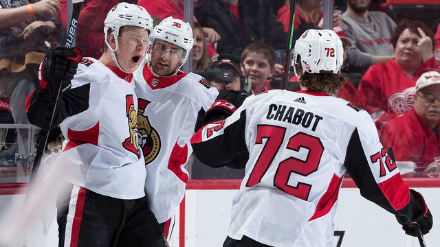 DETROIT, MI - FEBRUARY 14: Brady Tkachuk #7 of the Ottawa Senators celebrates his first period goal with teammates Colin White #36 and Thomas Chabot #72 during an NHL game against the Detroit Red Wings at Little Caesars Arena on February 14, 2019 in Detroit, Michigan.