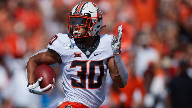 TULSA, OK - SEPTEMBER 14: Oklahoma State Cowboys RB Chuba Hubbard (30) looks back towards the defense on a long TD run during a college football game between the Tulsa Golden Hurricane and the Oklahoma State Cowboys on September 14, 2019, at H.A. Chapman Stadium in Tulsa, OK.