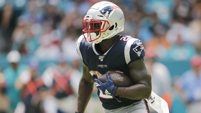 MIAMI, FLORIDA - SEPTEMBER 15: Sony Michel #26 of the New England Patriots runs with the ball against the Miami Dolphins at Hard Rock Stadium on September 15, 2019 in Miami, Florida.