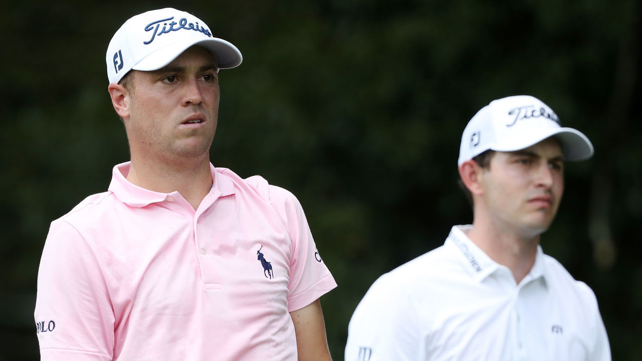 ATLANTA, GEORGIA - AUGUST 22: Justin Thomas of the United States and Patrick Cantlay of the United States look on from the second tee during the first round of the TOUR Championship at East Lake Golf Club on August 22, 2019 in Atlanta, Georgia.