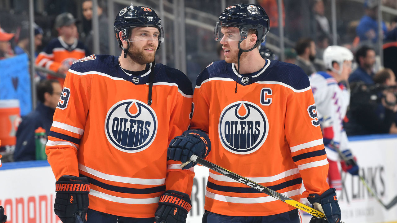 EDMONTON, AB - MARCH 11: Connor McDavid #97 and Leon Draisaitl #29 of the Edmonton Oilers warm up prior to the game against the New York Rangers on March 11, 2019 at Rogers Place in Edmonton, Alberta, Canada.