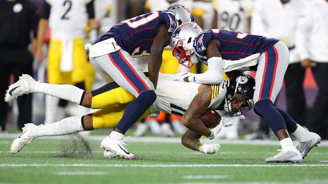 FOXBOROUGH, MASSACHUSETTS - SEPTEMBER 08: Donte Moncrief #11 of the Pittsburgh Steelers is tackled by the New England Patriots during the second half at Gillette Stadium on September 08, 2019 in Foxborough, Massachusetts.