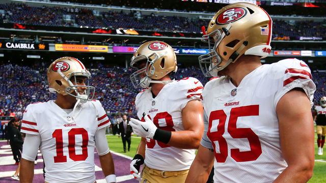 MINNEAPOLIS, MN - SEPTEMBER 9: Jimmy Garoppolo #10, Garrett Celek #88 and George Kittle #85 of the San Francisco 49ers talk on the field prior to the game against the Minnesota Vikings at U.S. Bank Stadium on September 9, 2018 in Minneapolis, Minnesota. The Vikings defeated the 49ers 24-16.