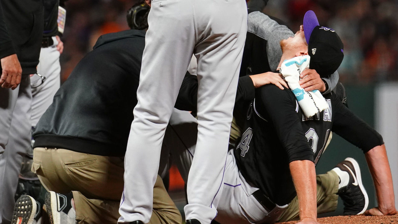 SAN FRANCISCO, CALIFORNIA - SEPTEMBER 24: Jeff Hoffman #34 of the Colorado Rockies reacts to being hit in the leg with a line drive during the fourth inning against the San Francisco Giants at Oracle Park on September 24, 2019 in San Francisco, California.